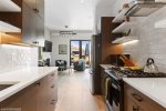 Gas burning range in this contemporary space 